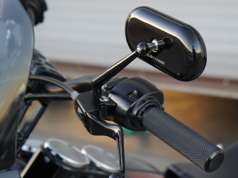 Arlen Ness Forged Oval Mirror fitted to a Harley-Davidson